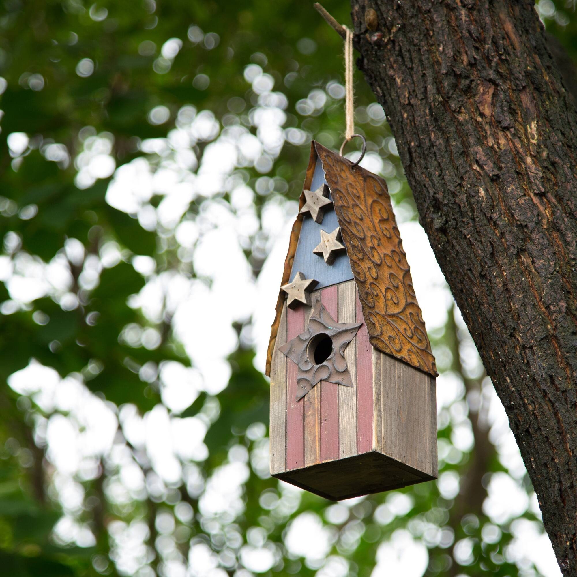 Glitzhome® Distressed Wood & Metal Patriotic Bird House with Stars